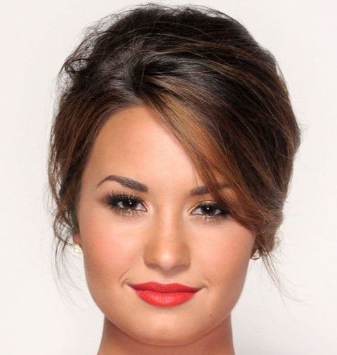 Side swept long bun hair