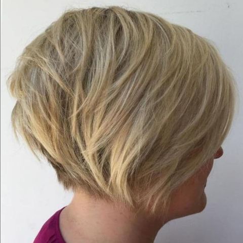 Angled layered short hair over 50