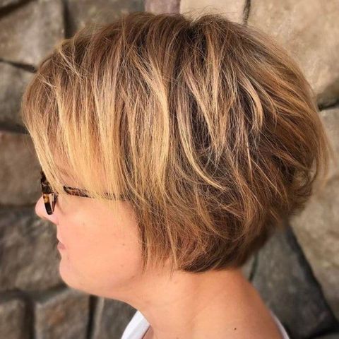 Layered short hair for women with glasses