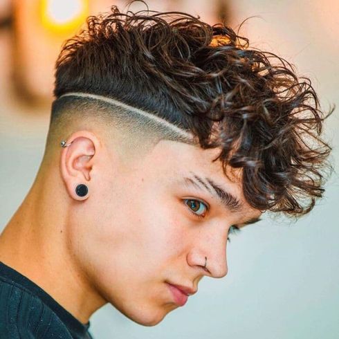 Line undercut curly hair for boys