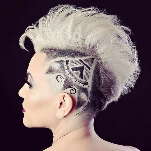 Undercut mohawk with tattoos