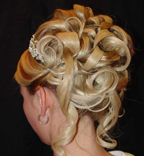 Blonde highlight curly bun hair for wedding day