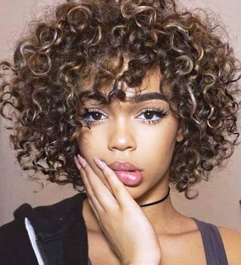 Curly short bob for round face