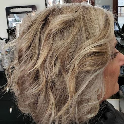 Soft wavy blonde bob haircut