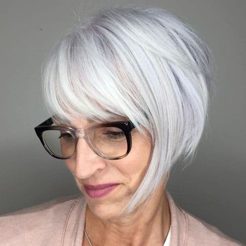 Grey asymmetrical short haircut for women oer 60