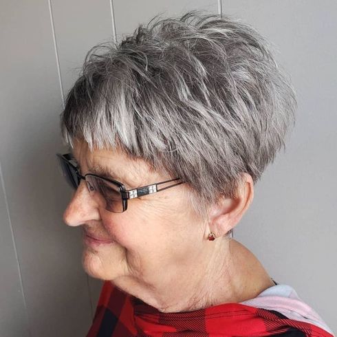 Balayage messy pixie haircut for women over 60 with glasses