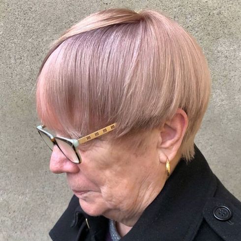 Pink short haircut for older women over 70