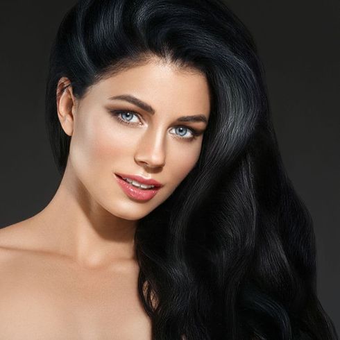 Dark hair color for women with oval faces