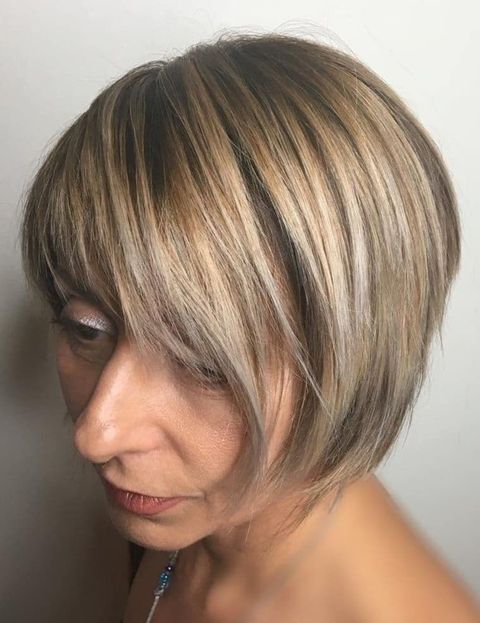 Asymmetrical short hair over 50