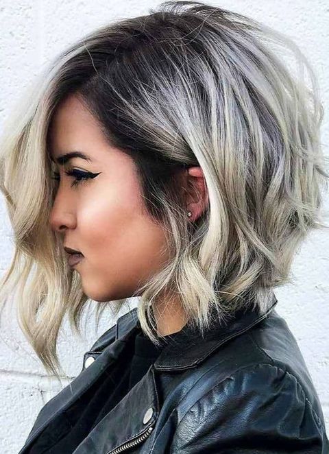 Asymmetrical short bob haircut with long bangs