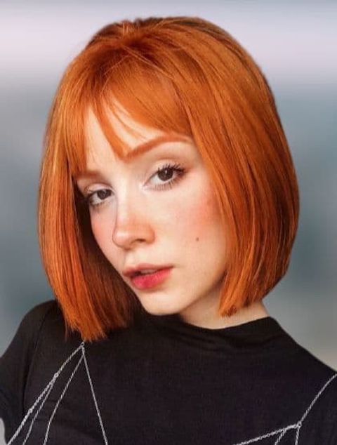 Red bob haircut with bangs