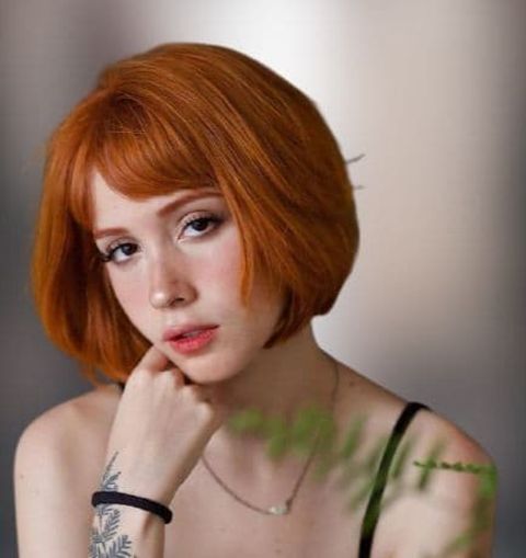 Short bob with red hair color