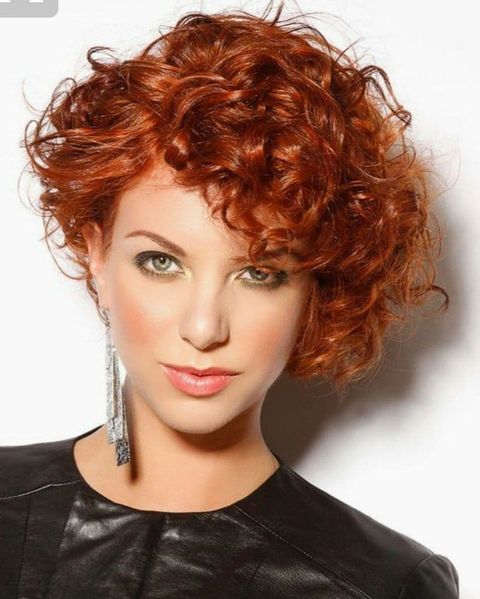 Asymmetrical short bob haircut red hair color