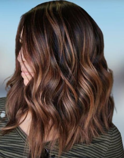 Long hair caramel highlights