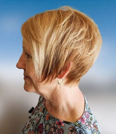 Asymmetrical pixie haircut for older women over 60