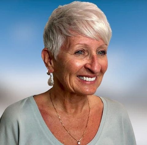 Highlight blonde pixie hairstyle for women over 60