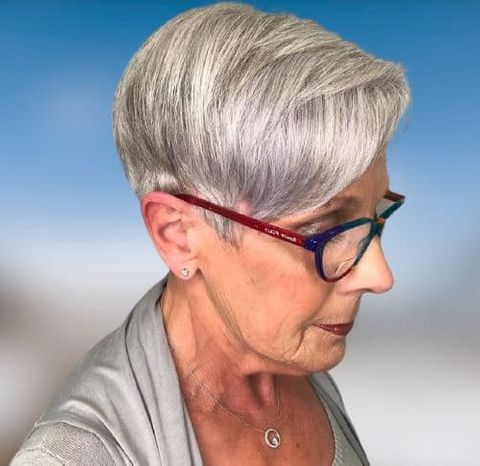 Layered side swept short hair for older women over 60