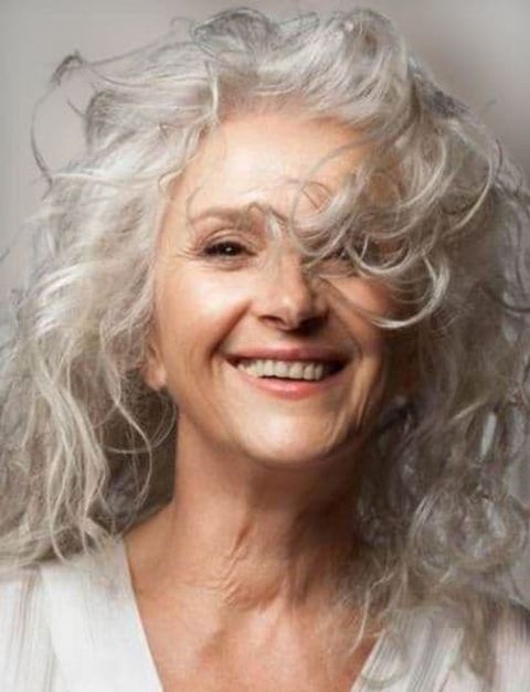 Blonde curly long hair for older women over 60