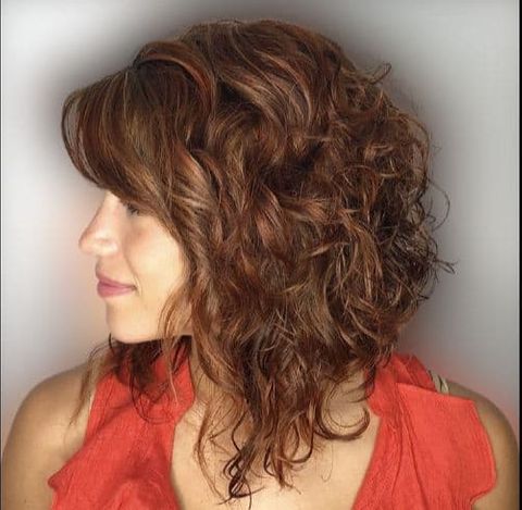 Angled curly Mid-length hairstyle