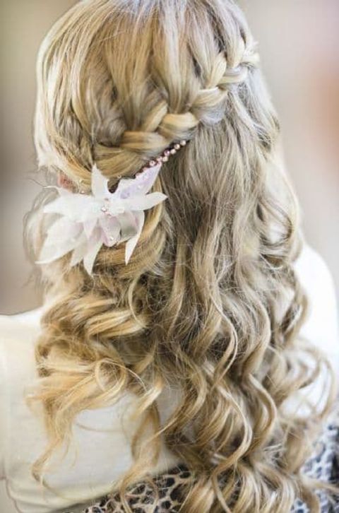 Waterfall braids with floral accessories