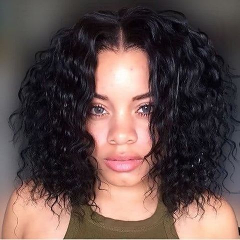Center parted curly bob for black women with round face