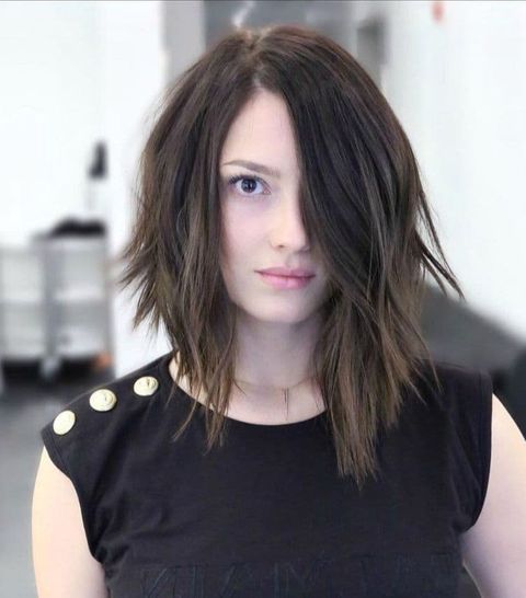 Asymmetrical mid-length hair