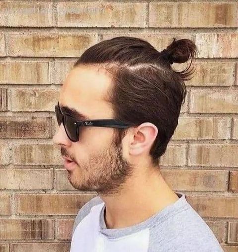 Ponytail hairstyle for men with glasses 2021-2022