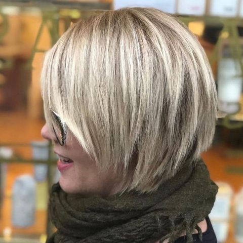 Blonde ombre layered bob cut with fringe