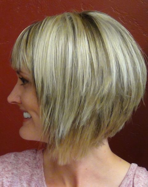 Layered short haircut with bangs