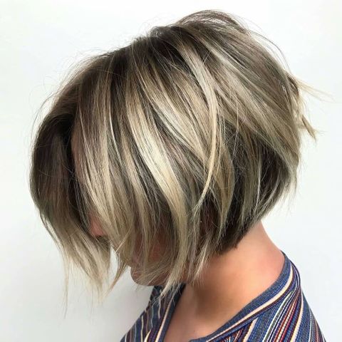 Stylish short haircut with bangs