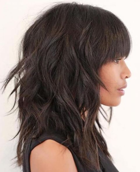 Soft wavy layered shoulder length hair