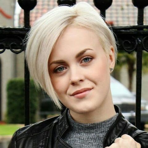 Side parted blonde bob hairstyle