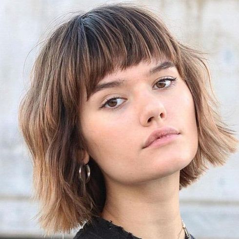 Brown balayage wavy blunt bob cut with bangs