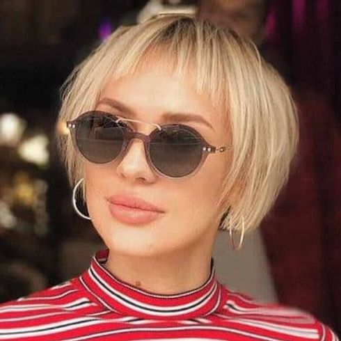 Short hair cut with bangs for women