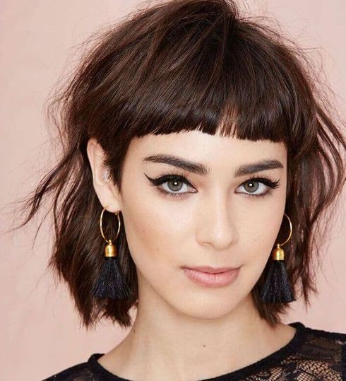 Textured wavy short hair with bangs