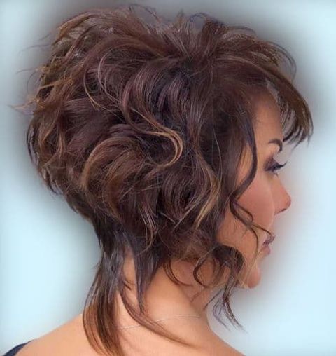 Asymmetrical curly short haircut 2021