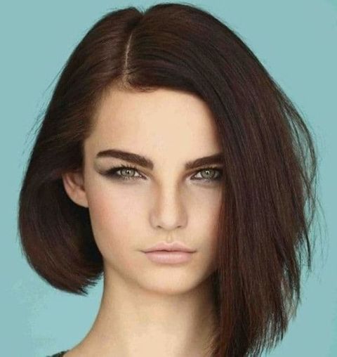 Voluminous asymmetrical bob haircut