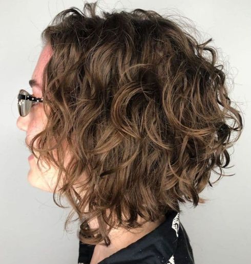 Angled curly short hair for women with glasses