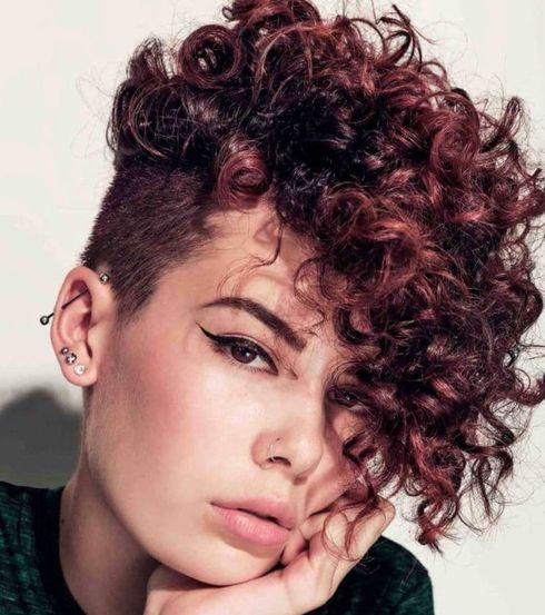 Side undercut red balayage curly hair