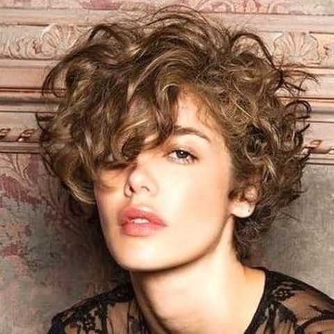 Curly bob haircut with bangs 2020 - 2021