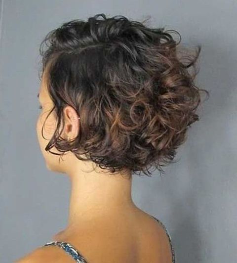 Side swept curly bob haircut 2020