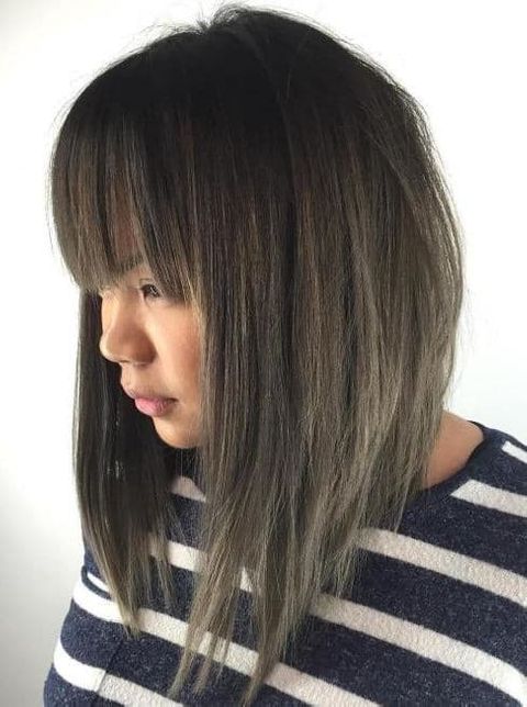 Angled lob cut with bangs