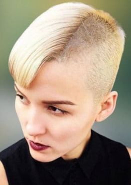 Side undercut pixie hairstyle blonde hair color for women